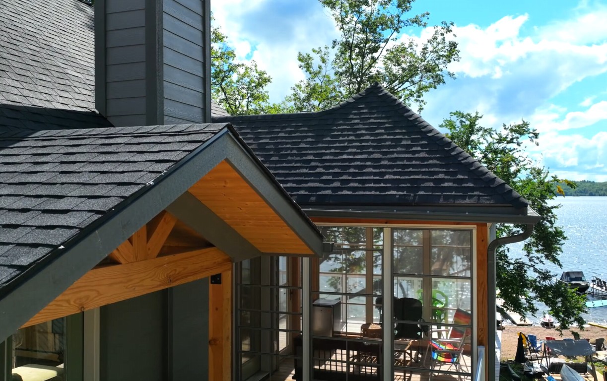 Lakeside sunroom retreat with wood beam ceiling in Clearwater, FL